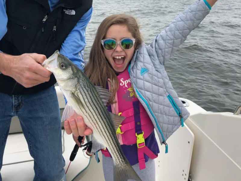 girl caught her first rockfish