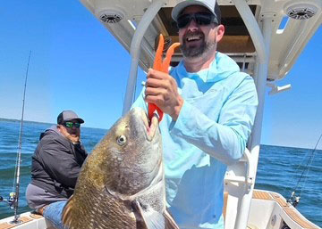 angler wearing magellan outdoors clothing