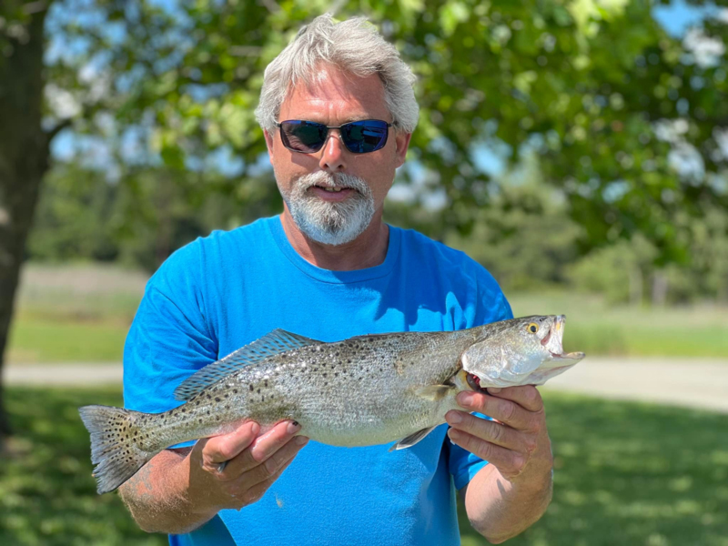 speck angler with a fish