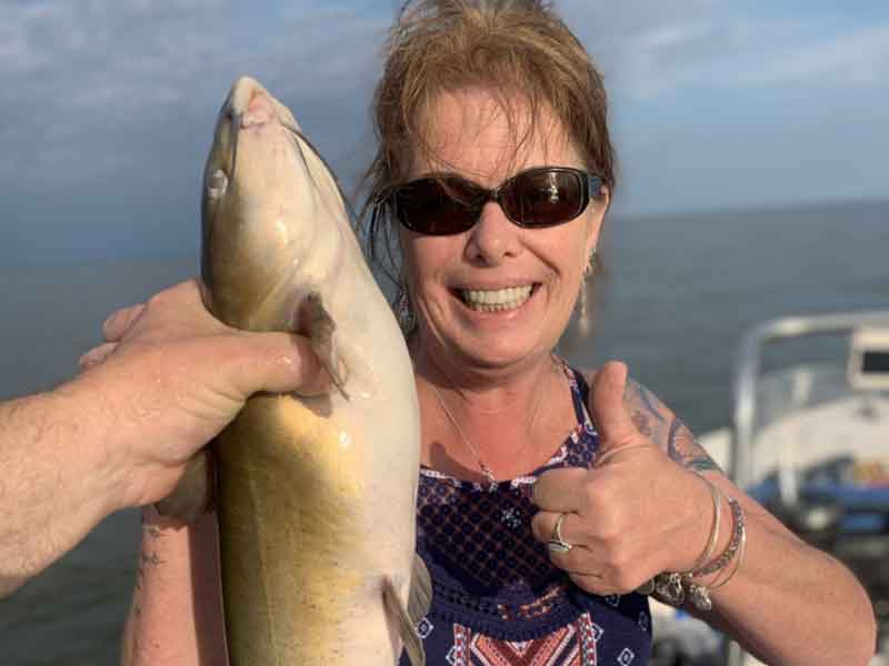 upper bay angler with a catfish