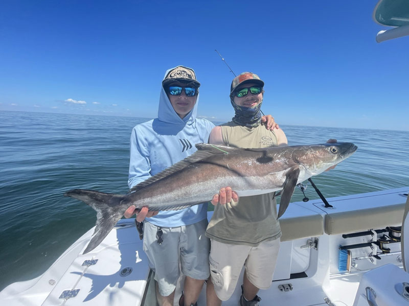 cobia anglers with a fish