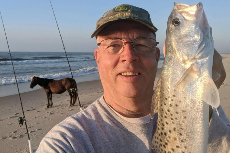 the author fishing on the beach