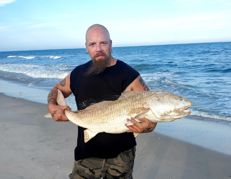 big red drum in the surf