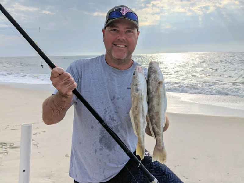 angler with kingfish