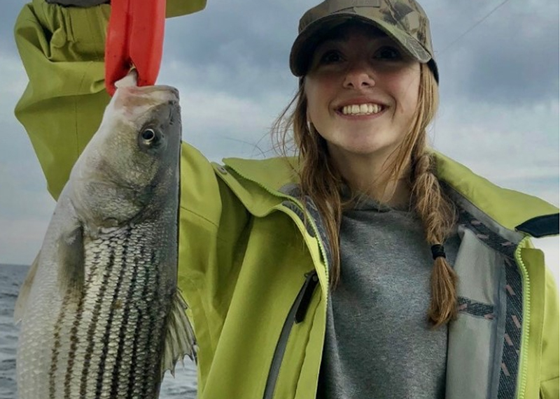 angler with a rockfish in virginia