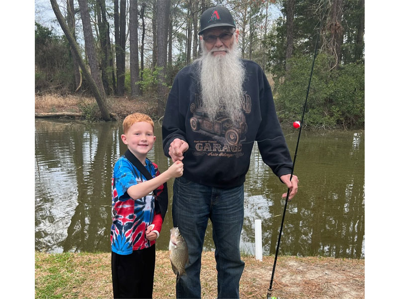 young angler with his catch