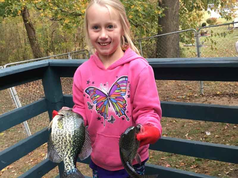 girl angler with crappie fish