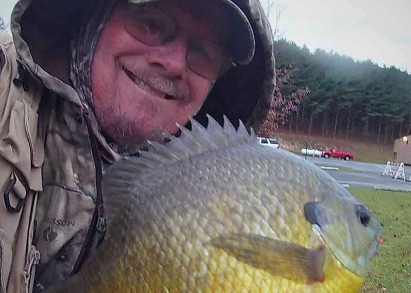 angler with a sunfish