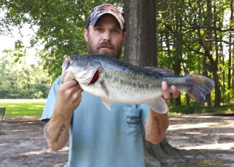 big largemouth bass caught fishing from shore