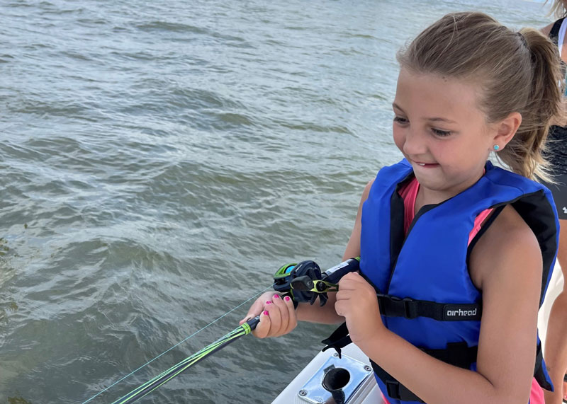 young children fishing