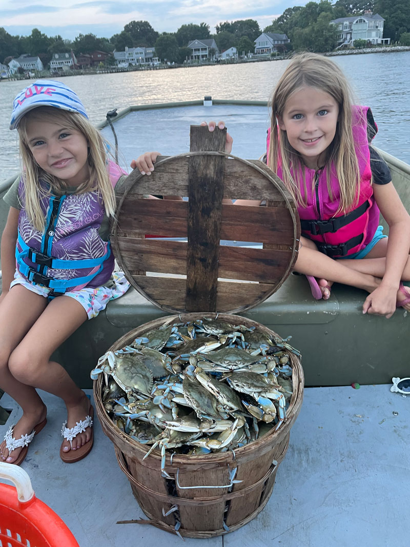 girls with a bushel of crabs