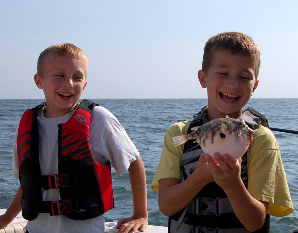 kids fishing for blowfish