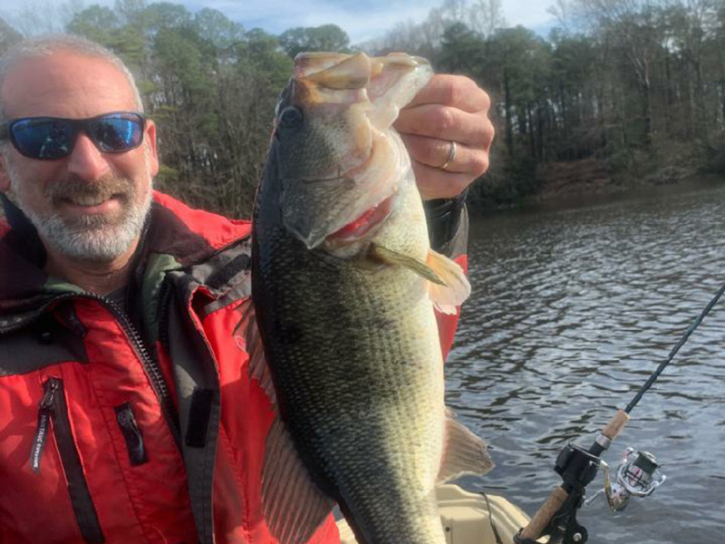 largemouth bass caught on a boat