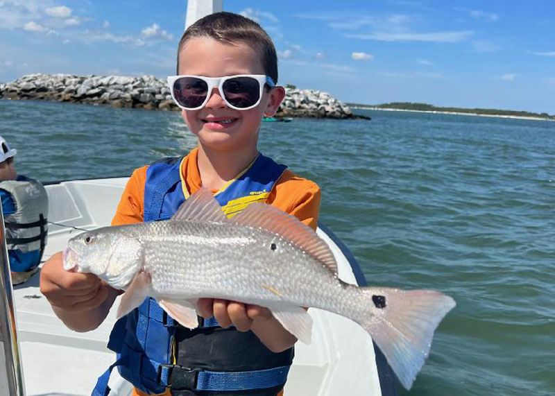 boy caught a slot red