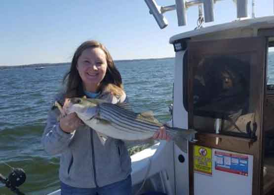 rockfish angler with her catch