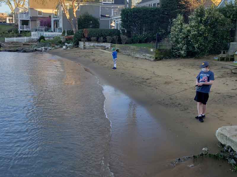 two boys fishing