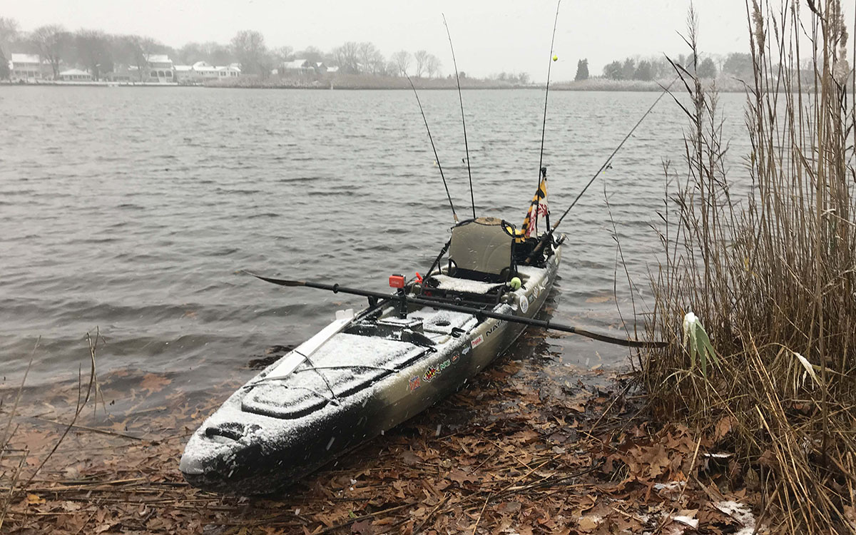 snowy fishing kayak