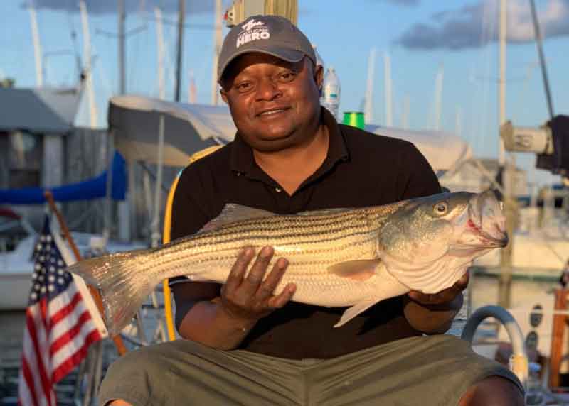 angler with a big rockfish