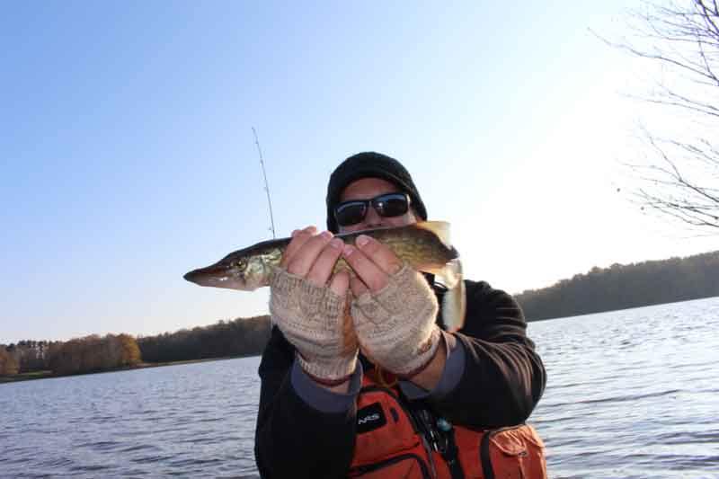 kayak angler with a pickerel