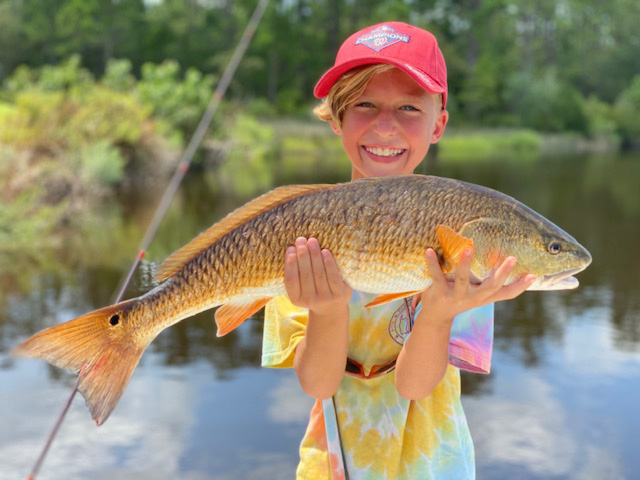 puppy drum caught by a kid