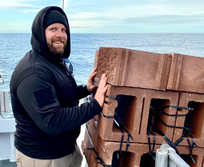 pushing reef material off boat