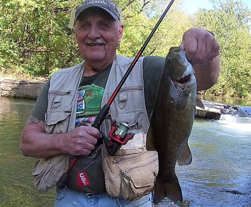 smallmouth bass fishing in a river