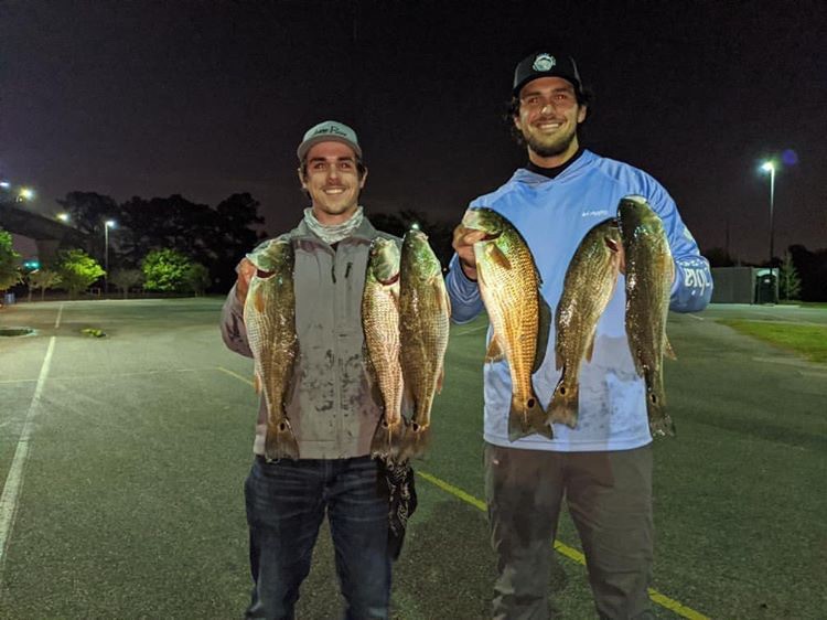 anglers with red drum