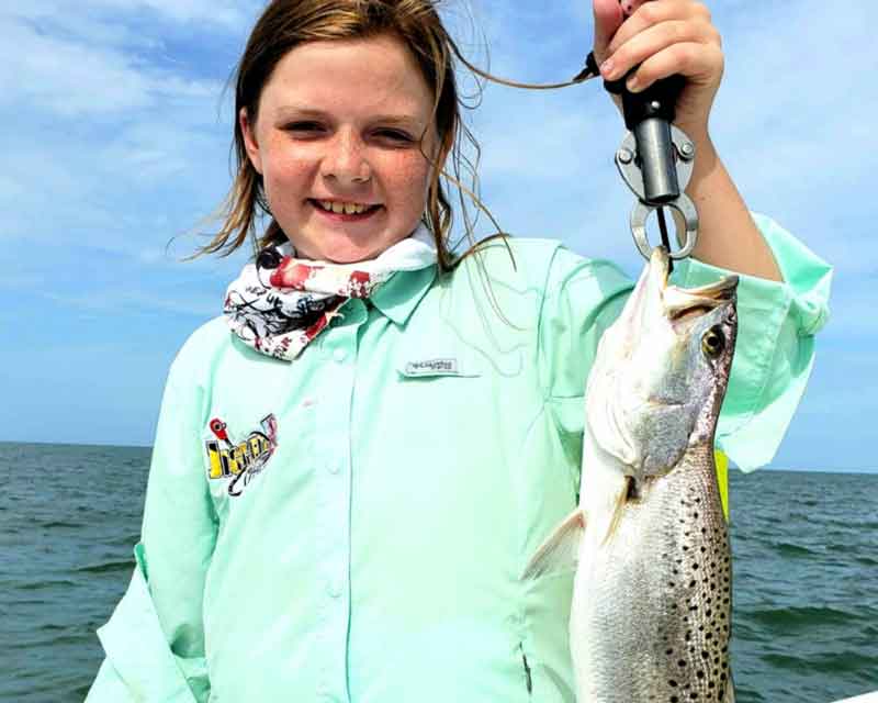girl caught a speckled sea trout