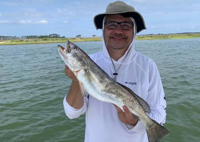 speckled trout in the shallows