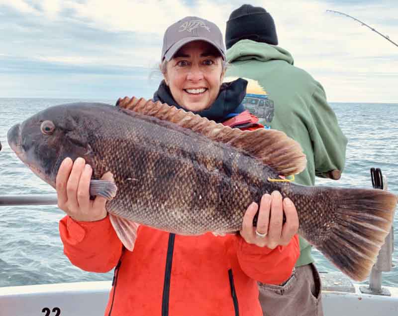 tautog angler has a big catch