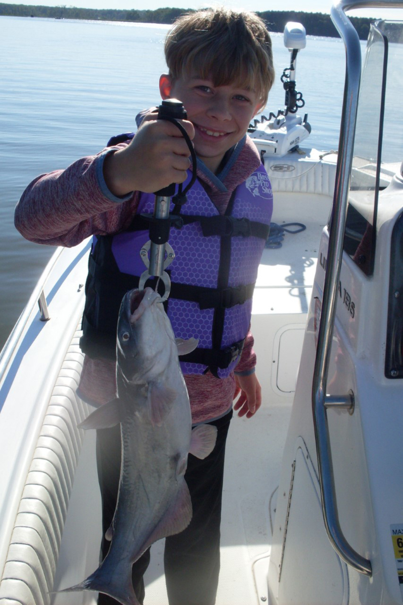 grandson with catfish