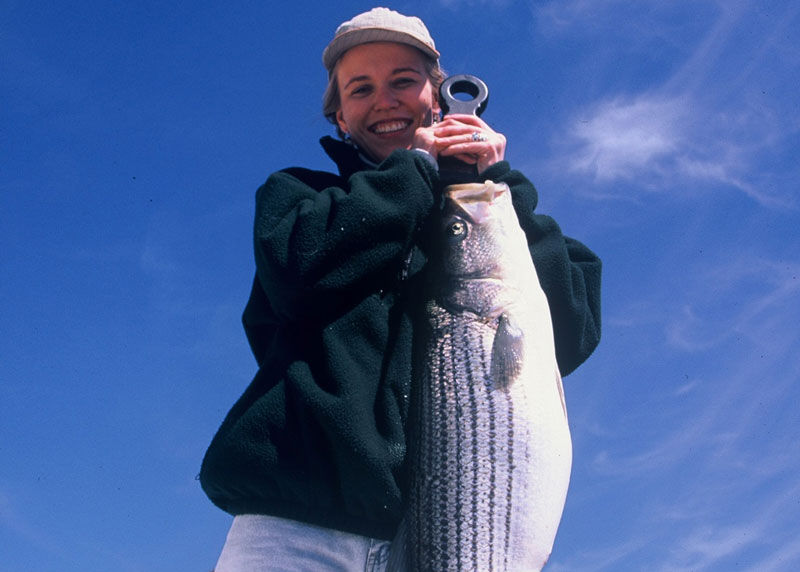 holding up a tropky rockfish