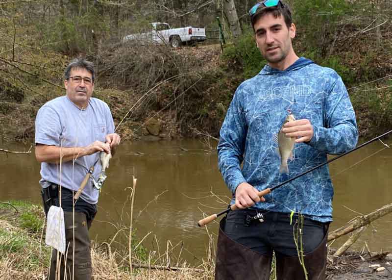 white perch anglers with fish