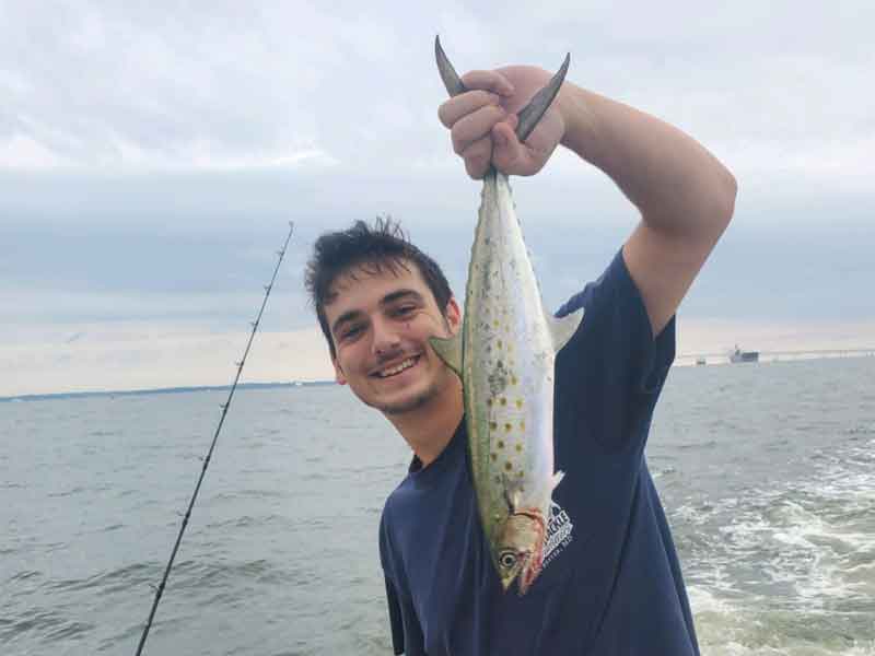 angler with a mackerel