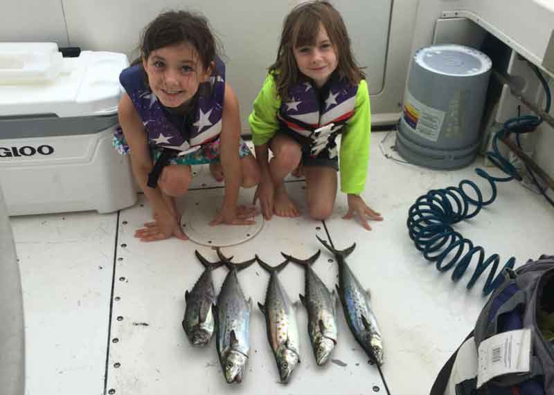 happy anglers with fish