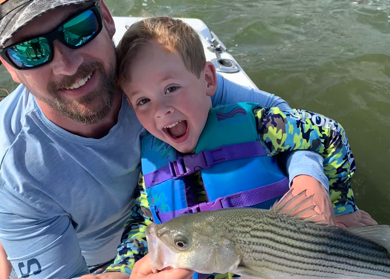 child angler with a rockfish