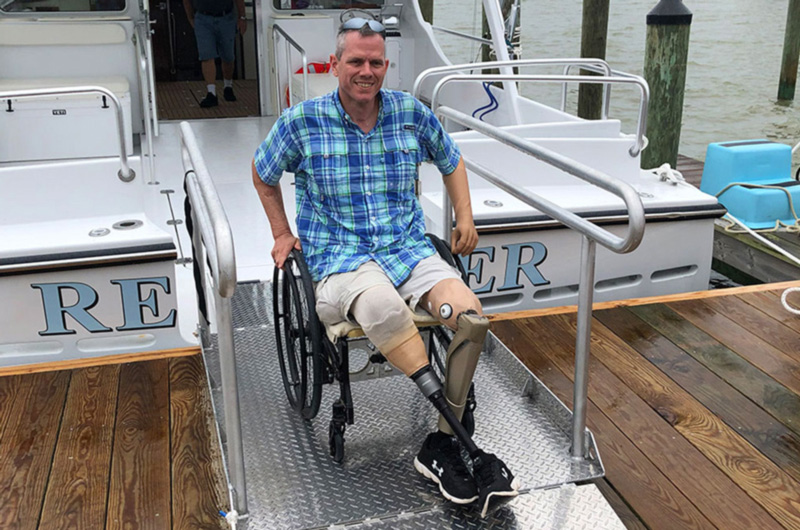 guy in wheelchair on boat